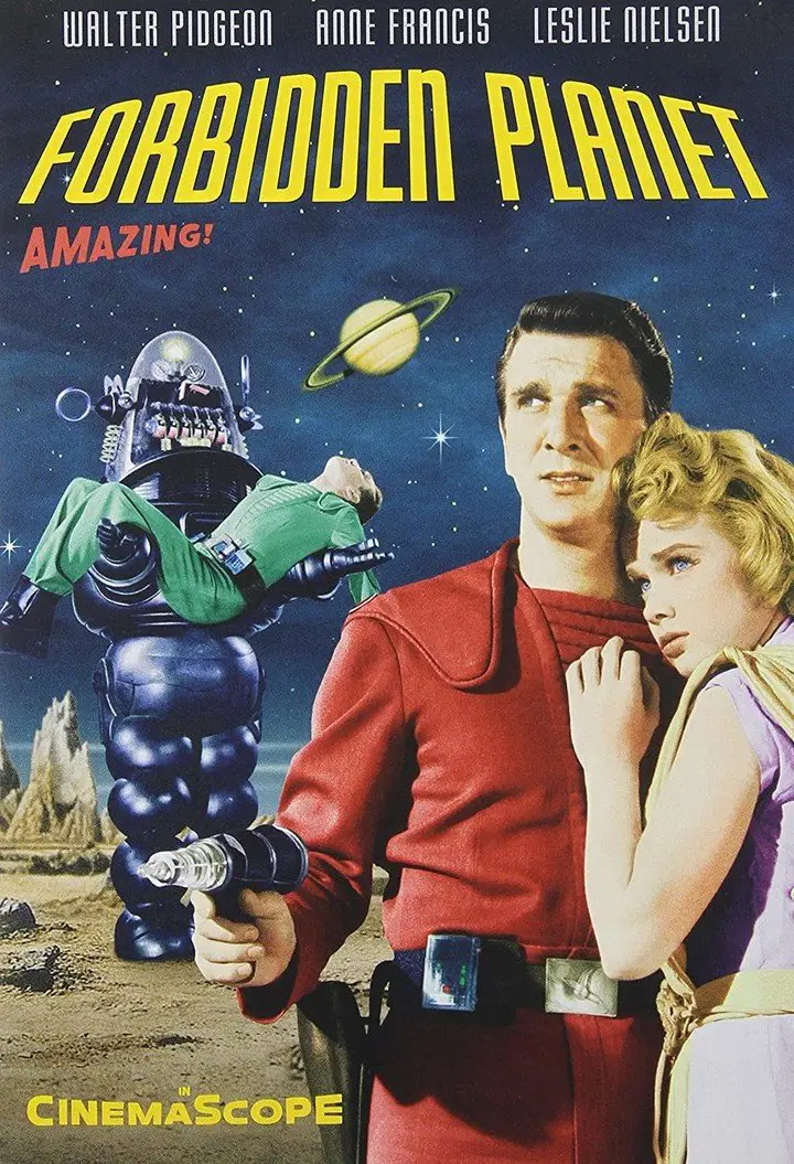 ¡Morocho! Nielsen, junto a Anne Francis, en el afiche de "El planeta prohibido", su primer éxito, de 1956. Foto Archivo Clarín