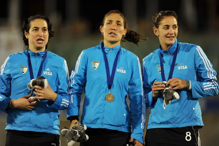 Gulla, García y Aymar, con la de Oro en la Champions Trophy 2009 (AFP)